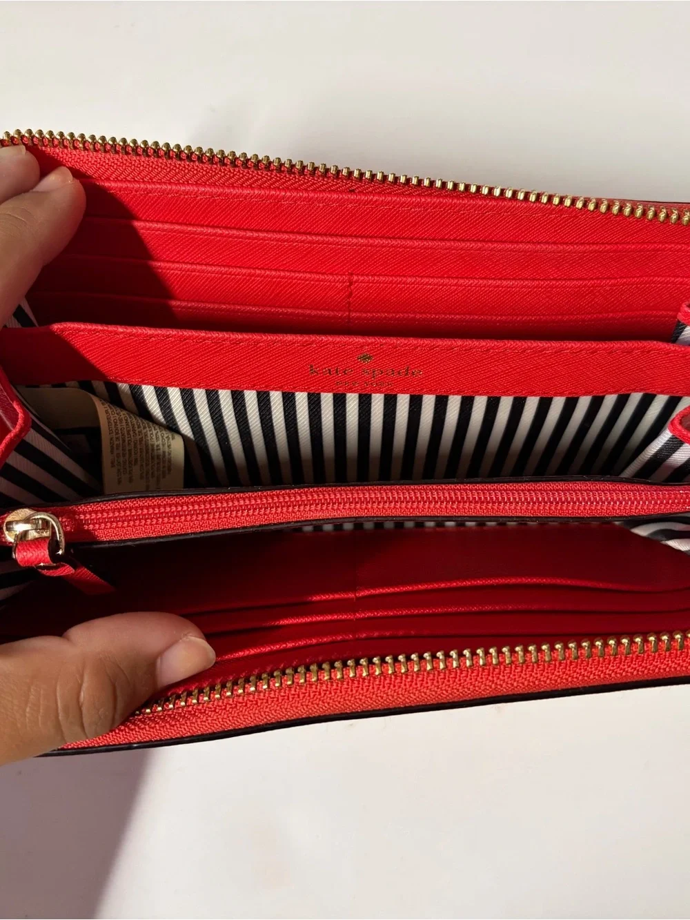 kate spade red zip-around leather continental wallet